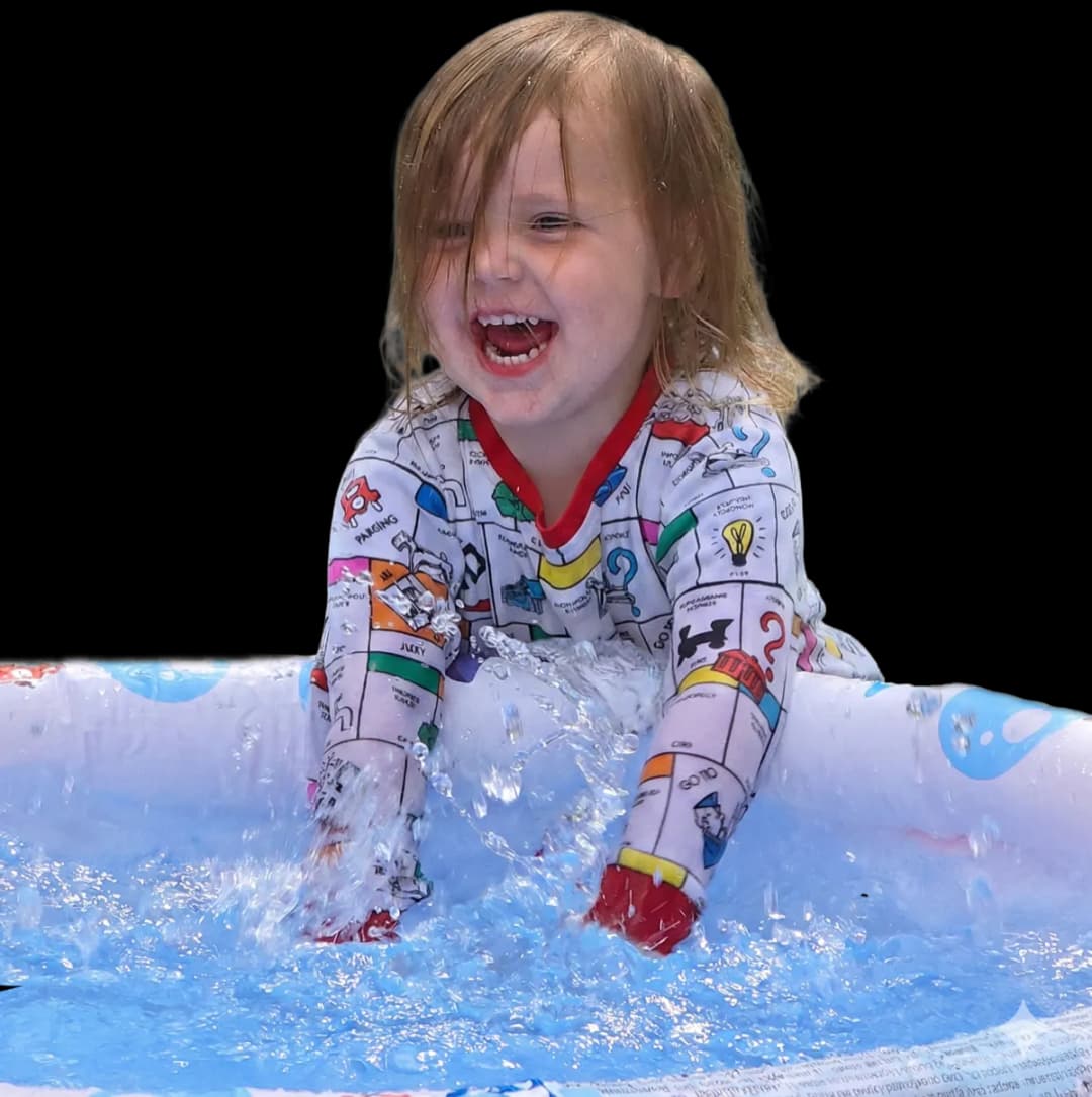 Happy child playing in water